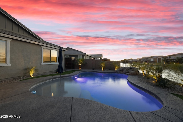 view of swimming pool with a fenced backyard and a fenced in pool