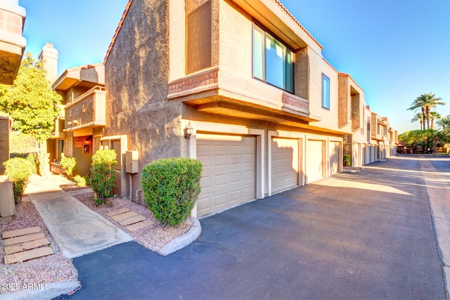 exterior space with a garage