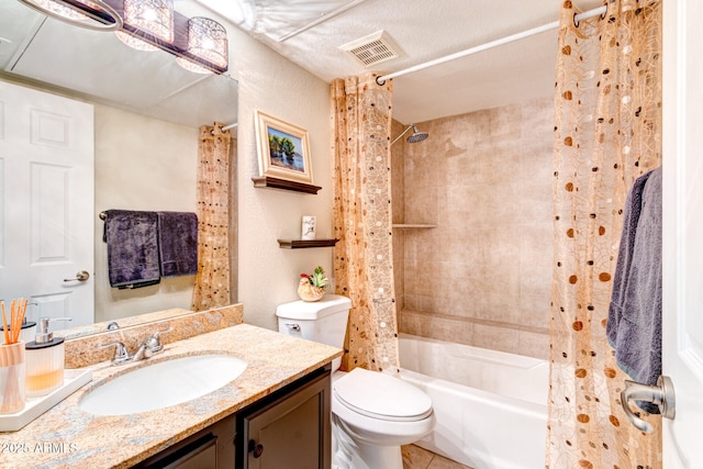 full bathroom with a textured ceiling, shower / tub combo with curtain, vanity, and toilet