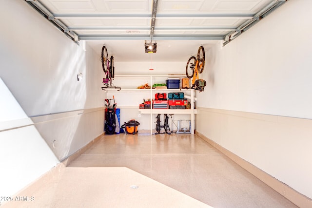 garage featuring a garage door opener