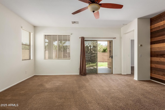 871 E Melanie St, San Tan Valley, AZ 85140 - unfurnished room featuring carpet, healthy amount of natural light, ceiling fan, and baseboards