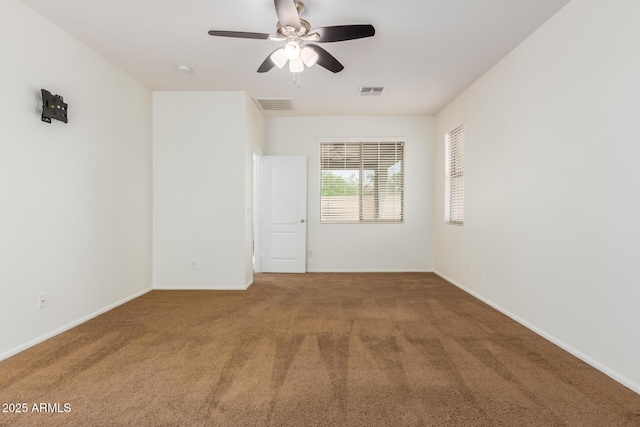 871 E Melanie St, San Tan Valley, AZ 85140 - unfurnished room featuring carpet flooring, a ceiling fan, and baseboards