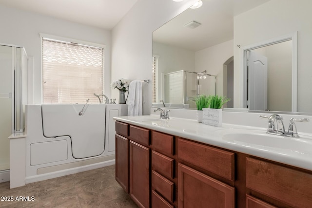 871 E Melanie St, San Tan Valley, AZ 85140 - full bath with a shower stall, a tub to relax in, and double vanity