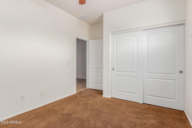 871 E Melanie St, San Tan Valley, AZ 85140 - unfurnished bedroom featuring carpet floors, a closet, baseboards, and a ceiling fan