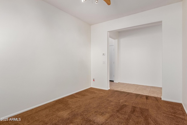 871 E Melanie St, San Tan Valley, AZ 85140 - spare room with light carpet, ceiling fan, and baseboards