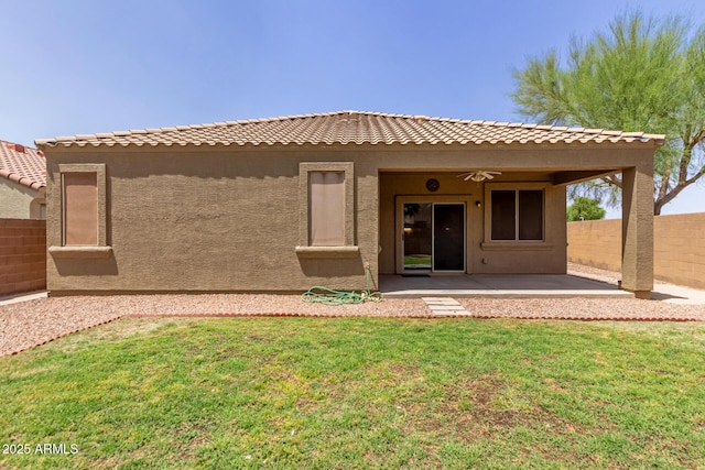 871 E Melanie St, San Tan Valley, AZ 85140 - back of property with a patio area, stucco siding, and ceiling fan