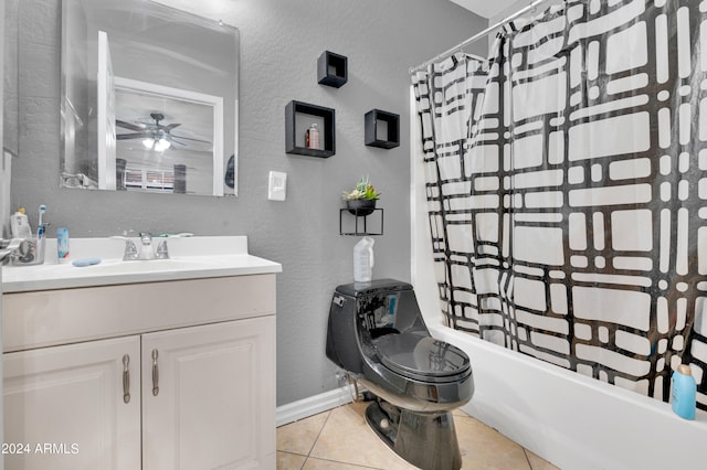 full bathroom with tile patterned flooring, ceiling fan, toilet, shower / bath combination with curtain, and vanity