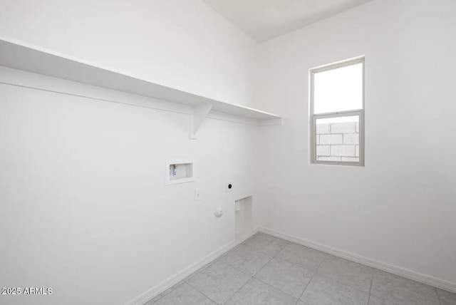 laundry room featuring laundry area, hookup for a washing machine, electric dryer hookup, and baseboards