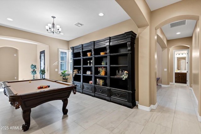 playroom with a chandelier