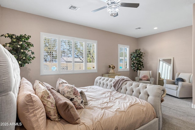 carpeted bedroom featuring ceiling fan