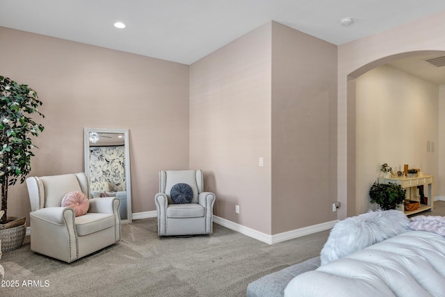 sitting room with light carpet