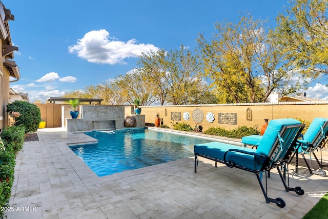 view of swimming pool featuring a patio area and pool water feature