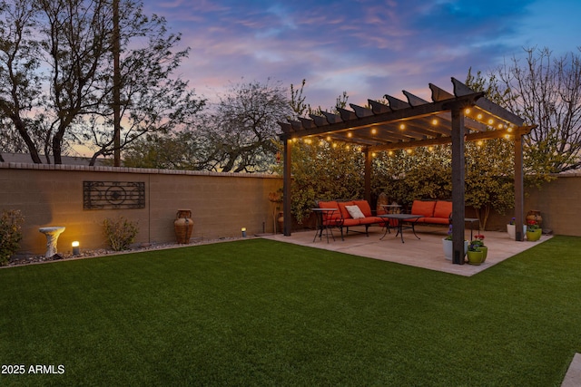 yard at dusk featuring a pergola, outdoor lounge area, and a patio