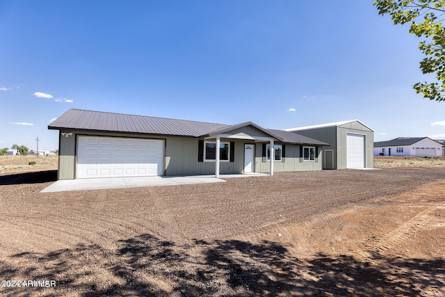 ranch-style home featuring a garage