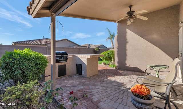 view of patio / terrace with grilling area, area for grilling, and ceiling fan