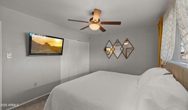 7543 E Portland St, Scottsdale, AZ 85257 - carpeted bedroom featuring a ceiling fan and baseboards