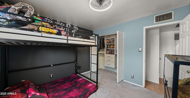 7543 E Portland St, Scottsdale, AZ 85257 - bedroom with carpet floors and a closet