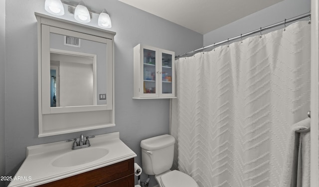 7543 E Portland St, Scottsdale, AZ 85257 - bathroom with vanity and a shower with curtain