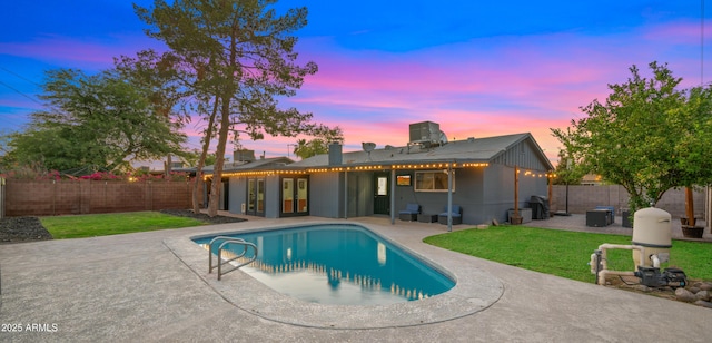 7543 E Portland St, Scottsdale, AZ 85257 - view of pool featuring a patio, a fenced backyard, and french doors