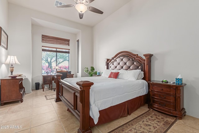 tiled bedroom with ceiling fan