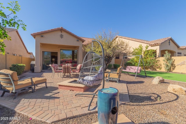 rear view of house with a patio area