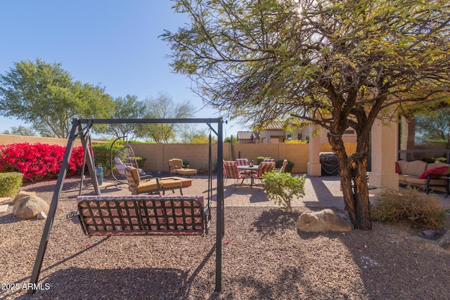 exterior space featuring an outdoor hangout area