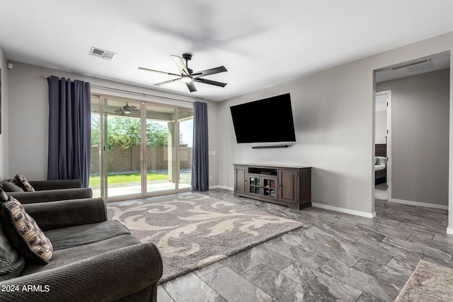 living room with ceiling fan