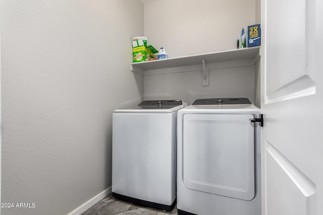 washroom featuring independent washer and dryer