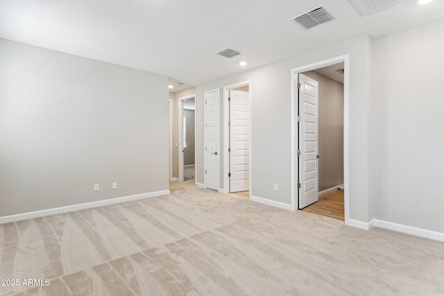 21228 N 58th St, Phoenix, AZ 85054 - unfurnished bedroom with light carpet, recessed lighting, and baseboards