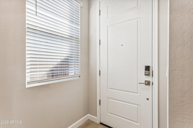 21228 N 58th St, Phoenix, AZ 85054 - doorway to outside with baseboards