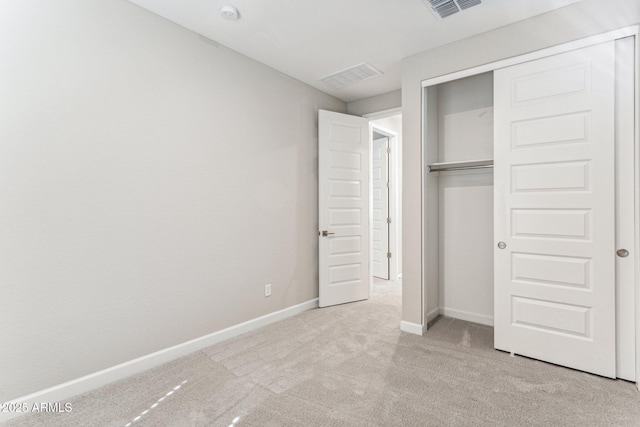 21228 N 58th St, Phoenix, AZ 85054 - unfurnished bedroom featuring carpet, baseboards, and a closet