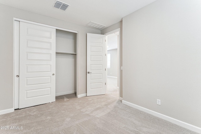 21228 N 58th St, Phoenix, AZ 85054 - unfurnished bedroom featuring a closet, carpet floors, and baseboards