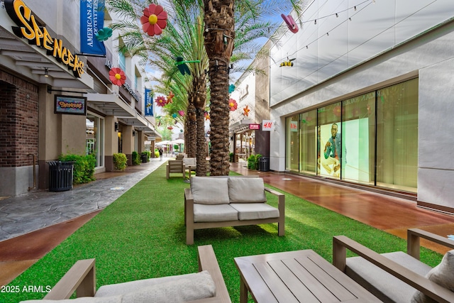 21228 N 58th St, Phoenix, AZ 85054 - view of green lawn with outdoor lounge area
