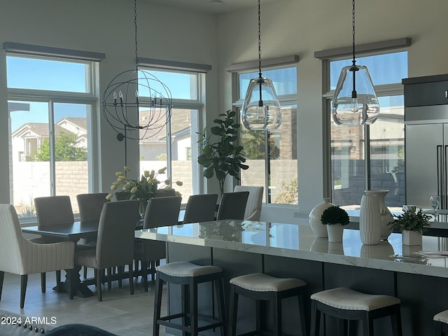 dining space featuring a chandelier