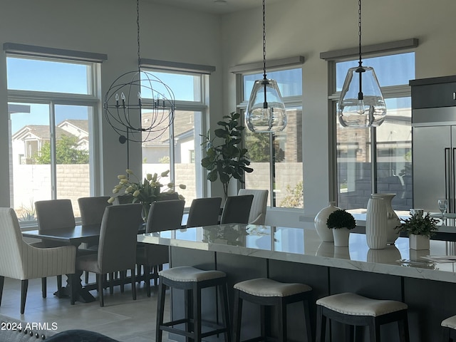 20475 E Indiana Ave, Queen Creek, AZ 85142 - dining area with plenty of natural light and a chandelier
