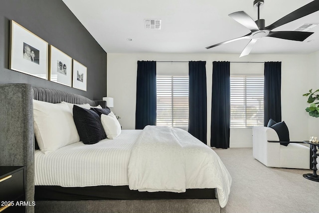 20475 E Indiana Ave, Queen Creek, AZ 85142 - bedroom featuring light carpet, multiple windows, and a ceiling fan