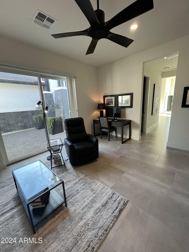 living room featuring ceiling fan