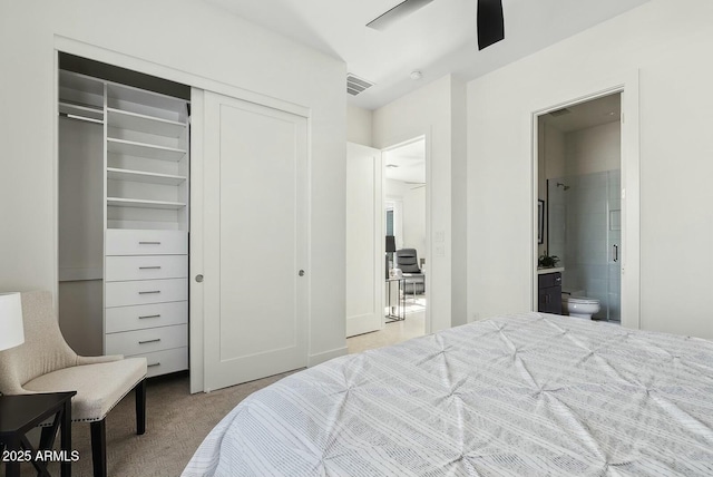 20475 E Indiana Ave, Queen Creek, AZ 85142 - carpeted bedroom featuring ensuite bath, a closet, and a ceiling fan