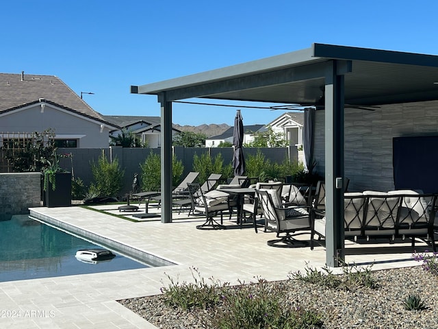 view of patio / terrace featuring a fenced in pool