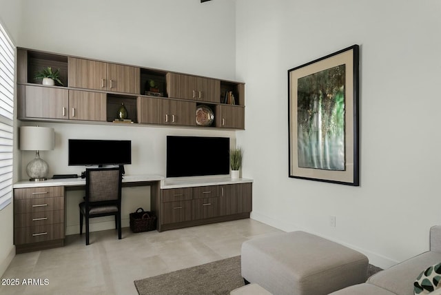 20475 E Indiana Ave, Queen Creek, AZ 85142 - office area featuring built in desk and baseboards