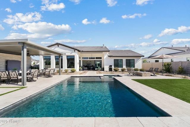 20475 E Indiana Ave, Queen Creek, AZ 85142 - rear view of property featuring a patio, an outdoor living space with a fire pit, a ceiling fan, and a pool with connected hot tub
