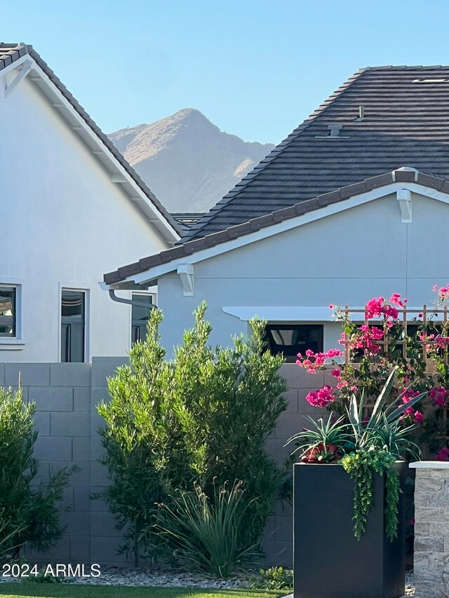 view of side of property featuring a mountain view