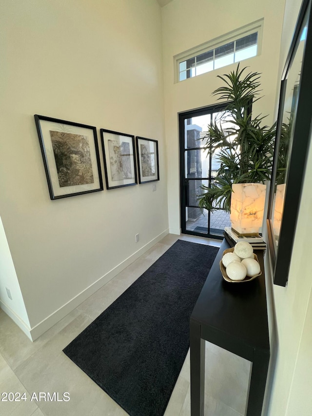 entrance foyer featuring a high ceiling