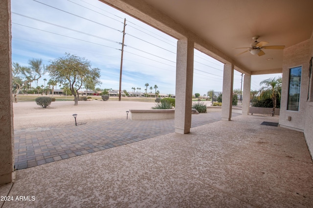 exterior space featuring ceiling fan