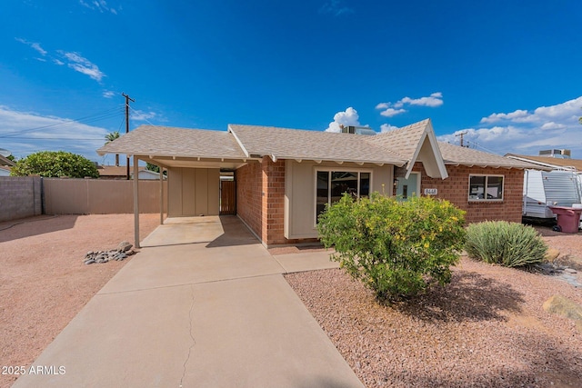 view of front of house featuring a carport