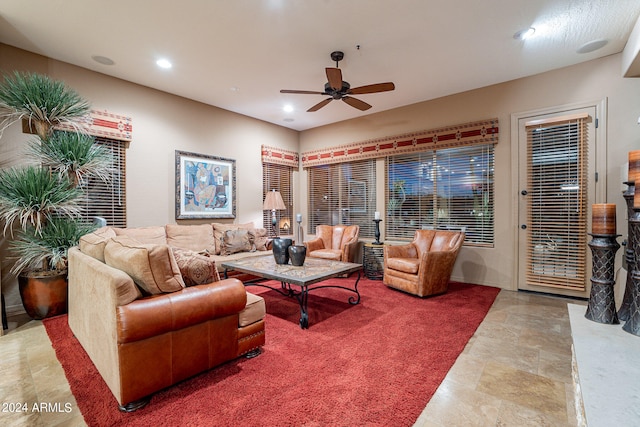 living room featuring ceiling fan