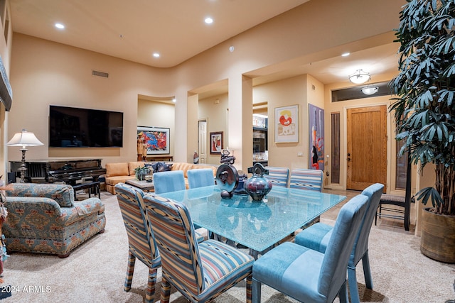 view of carpeted dining area