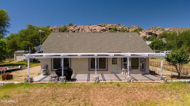 17696 W Foothill Rd, Yarnell, AZ 85362 - rear view of property featuring a pergola, a patio, and stucco siding