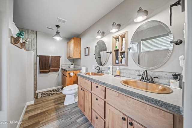 17696 W Foothill Rd, Yarnell, AZ 85362 - full bathroom featuring double vanity, wood finished floors, and a shower