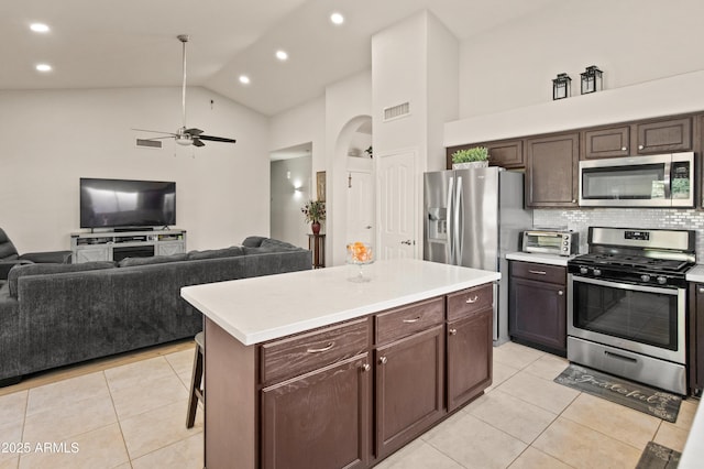 21335 N 64th Ave, Glendale, AZ 85308 - kitchen featuring appliances with stainless steel finishes, light tile patterned floors, light countertops, and visible vents